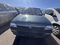 Subaru justy 1.3i 16v g3x airco awd, 1992 - afbeelding 8 van  15