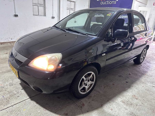 Suzuki - liana - 1.6 glx - 78-lr-dd- 2003 - afbeelding 1 van  17