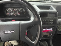 Suzuki - vitara - 1.6 comm. 4x4 jlx - vv-28-yd- 1993 - afbeelding 11 van  12