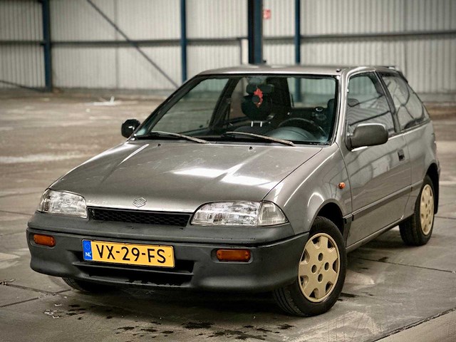 Suzuki swift 1.0 gc, vx-29-fs - afbeelding 1 van  12