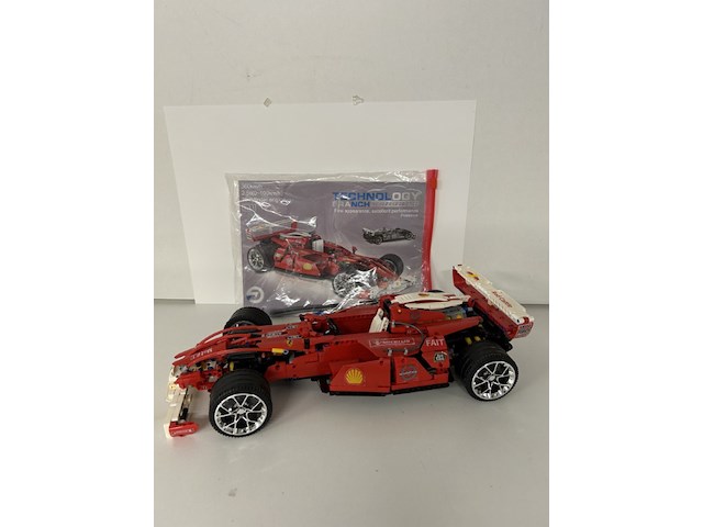 Technology branch ferrari-stijl f1 racewagen - rood / chroom velgen (met boekje) - afbeelding 3 van  3