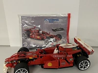 Technology branch ferrari-stijl f1 racewagen - rood / chroom velgen (met boekje)