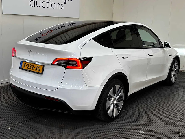 Tesla - model y - long range awd 75kwh - car - 2023 - afbeelding 16 van  34