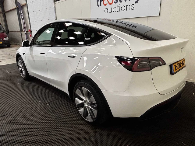 Tesla - model y - long range awd 75kwh - car - 2023 - afbeelding 29 van  34