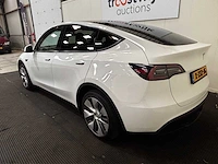 Tesla - model y - long range awd 75kwh - car - 2023 - afbeelding 29 van  34