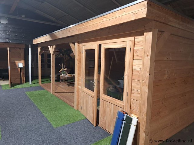 Tuinhuis (douglas) met overkapping - 670x250cm - afbeelding 1 van  10