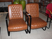 Twee industriële fauteuils met kunstlederen bekleding. - afbeelding 1 van  2