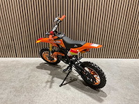 Ultra motocross db01 27ja oranje 49cc motorfiets - afbeelding 24 van  40