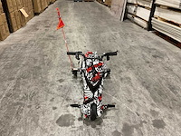 Ultra motocross drift trike 27ja 250w zwart/wit/rood voertuig - afbeelding 23 van  33