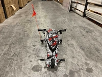 Ultra motocross drift trike 27ja 250w zwart/wit/rood voertuig - afbeelding 23 van  34