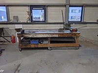 Verrijdbare werkbank met inhoud
