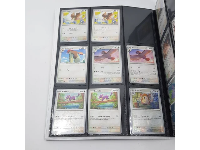Verzamelmap met kaarten, pokémon, o.a. ivysaur mew en 002/165 - afbeelding 39 van  43