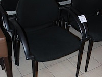 Vier buisstalen stoelen zwart gestoffeerd. - afbeelding 2 van  2