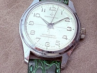 Vintage continental swiss time mechanisch horloge