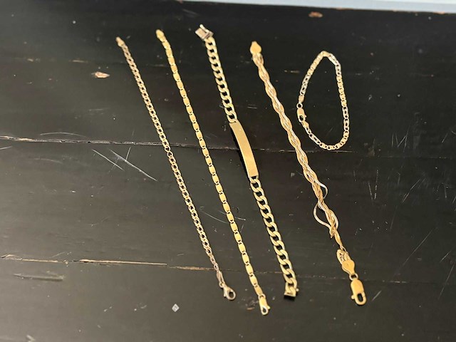 Vintage goudkleurige armbanden en schakelarmbanden - 7 delig - afbeelding 1 van  9