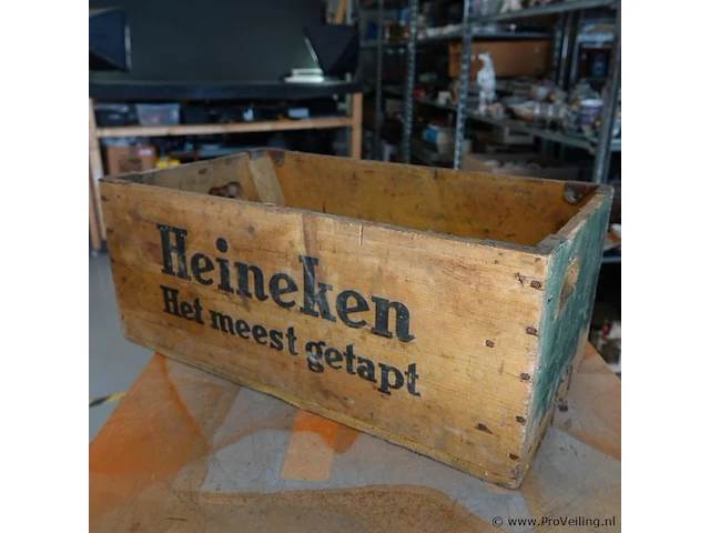 Vintage houten heineken-bierkrat met de iconische slogan "het meest getapt" uit de jaren 1960 - afbeelding 6 van  6