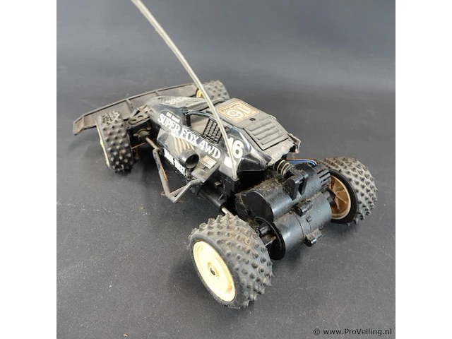 Vintage nikko super fox 4wd is een iconische 1:14 schaal frame buggy uit de jaren '80 - afbeelding 4 van  5