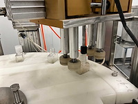 Volautomatische vul- sluit- en etiketteerlijn - afbeelding 4 van  30