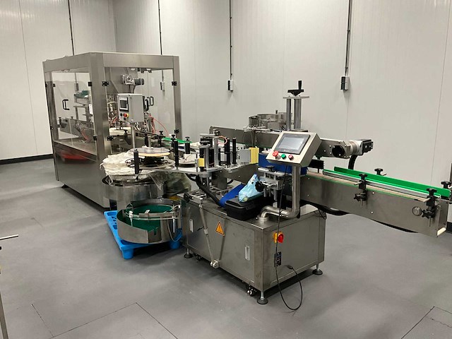 Volautomatische vul- sluit- en etiketteerlijn - afbeelding 1 van  30