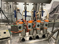 Volautomatische vul- sluit- en etiketteerlijn - afbeelding 21 van  30