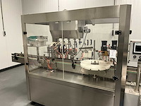 Volautomatische vul- sluit- en etiketteerlijn - afbeelding 23 van  30