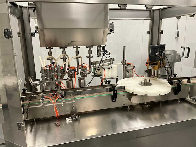 Volautomatische vul- sluit- en etiketteerlijn - afbeelding 27 van  30