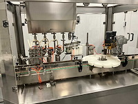 Volautomatische vul- sluit- en etiketteerlijn - afbeelding 27 van  30