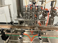 Volautomatische vul- sluit- en etiketteerlijn - afbeelding 28 van  30