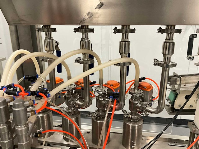 Volautomatische vul- sluit- en etiketteerlijn - afbeelding 29 van  30