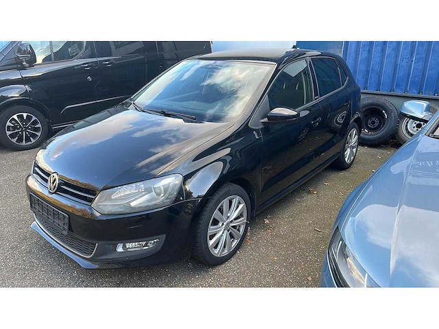 Volkswagen - 2011 - polo - 1.6 tdi highline automaat - 8-zll-21 - afbeelding 1 van  11