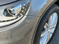 Volkswagen - tiguan - 2.0 tsi sport&st.4m - car - 2011 - afbeelding 26 van  33