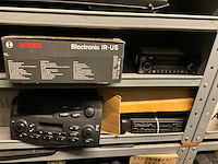 Voorraad auto-onderdelen o.a. koppelingskabels, ecu’s, autoradio’s, tellerklokken, schokdempers, bougiekabels, interieuronderdelen - afbeelding 22 van  22