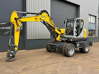 Wacker neuson - ew100 e06-03 - wheeled excavator - 2022 - afbeelding 1 van  26