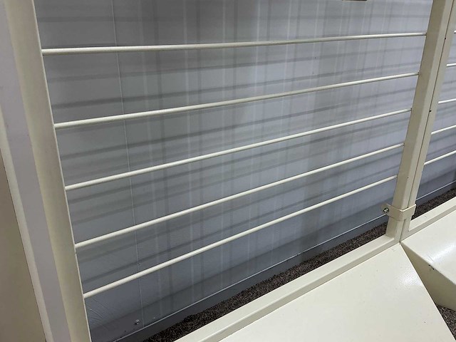 Wandstelling met tapijt samples - afbeelding 3 van  6