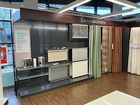 Winkelstelling met gordijnsamples - afbeelding 1 van  9