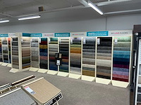 Winkelstelling met tapijt samples