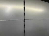 Winkelstelling met tapijt samples - afbeelding 6 van  7