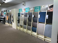 Winkelstelling met tapijt samples