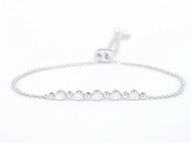 Witgouden armband met natuurlijke diamanten - afbeelding 1 van  8