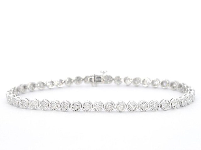 Witgouden armband vol met diamanten gezet - afbeelding 1 van  9