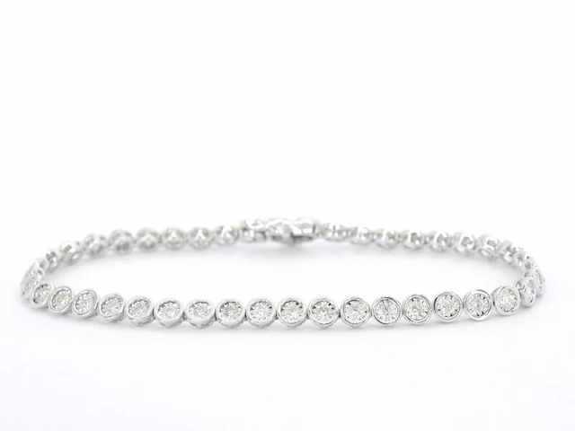 Witgouden armband vol met diamanten gezet - afbeelding 1 van  7