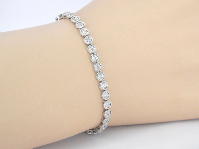 Witgouden armband vol met diamanten gezet - afbeelding 2 van  7