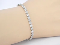 Witgouden armband vol met diamanten gezet - afbeelding 2 van  7