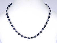 Witgouden collier met diamanten en saffier