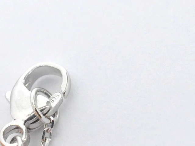 Witgouden collier met een rosegouden diamanten infinity hanger - afbeelding 7 van  9