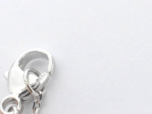 Witgouden collier met een rosegouden diamanten infinity hanger - afbeelding 7 van  7