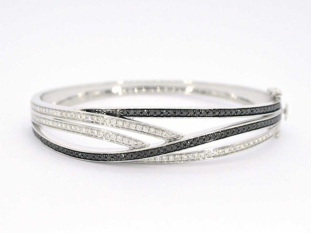 Witgouden design armband met witte en zwarte briljanten diamanten - afbeelding 1 van  6