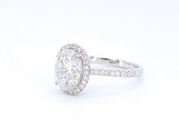 Witgouden entourage ring met diamanten en een gemaakte ovale briljant - afbeelding 10 van  11