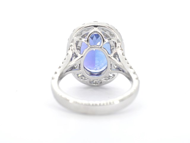 Witgouden entourage ring met een tanzaniet van 7.00 carat - afbeelding 10 van  13