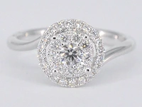 Witgouden entourage slagring met diamanten
